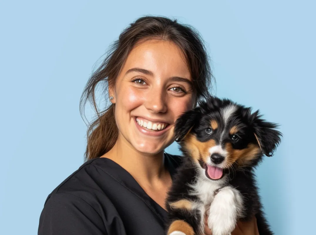Veterinarian with puppy